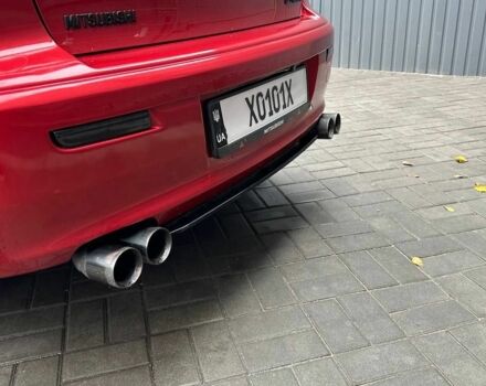 Червоний Міцубісі Lancer, об'ємом двигуна 2 л та пробігом 137 тис. км за 8500 $, фото 4 на Automoto.ua
