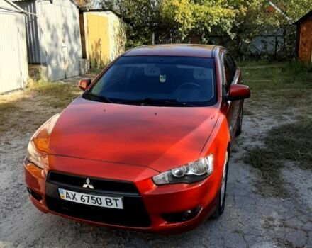 Красный Мицубиси Лансер, объемом двигателя 2 л и пробегом 110 тыс. км за 7500 $, фото 4 на Automoto.ua