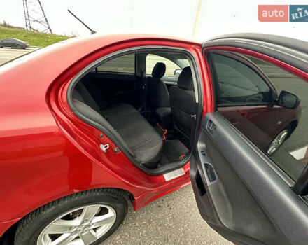 Червоний Міцубісі Lancer, об'ємом двигуна 2 л та пробігом 366 тис. км за 6500 $, фото 7 на Automoto.ua