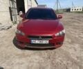 Червоний Міцубісі Lancer, об'ємом двигуна 2 л та пробігом 241 тис. км за 5500 $, фото 1 на Automoto.ua