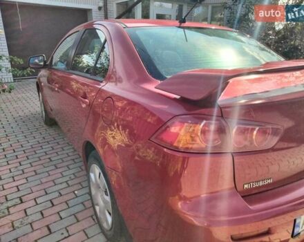 Міцубісі Lancer 2008 у Житомирі на Automoto.ua Червоний Міцубісі Lancer, об'ємом двигуна 1.5 л та пробігом 155 тис. км за 6200 $, фото 3 на Automoto.ua