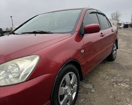 Червоний Міцубісі Lancer, об'ємом двигуна 1.6 л та пробігом 224 тис. км за 4300 $, фото 2 на Automoto.ua