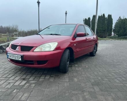 Красный Мицубиси Лансер, объемом двигателя 1.6 л и пробегом 265 тыс. км за 2956 $, фото 11 на Automoto.ua