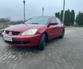 Красный Мицубиси Лансер, объемом двигателя 1.6 л и пробегом 265 тыс. км за 2956 $, фото 11 на Automoto.ua
