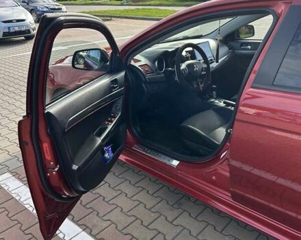 Красный Мицубиси Лансер, объемом двигателя 2 л и пробегом 227 тыс. км за 7000 $, фото 10 на Automoto.ua