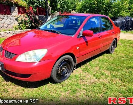 Красный Мицубиси Лансер, объемом двигателя 1.6 л и пробегом 140 тыс. км за 5500 $, фото 4 на Automoto.ua