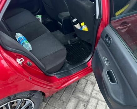 Красный Мицубиси Лансер, объемом двигателя 1.6 л и пробегом 265 тыс. км за 2956 $, фото 6 на Automoto.ua