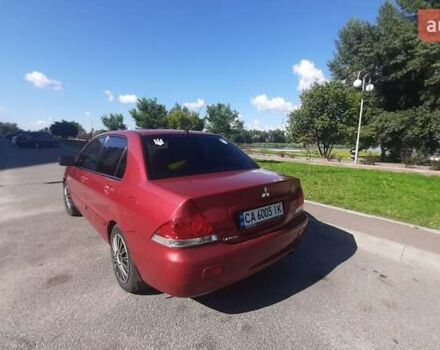 Червоний Міцубісі Lancer, об'ємом двигуна 1.6 л та пробігом 195 тис. км за 5500 $, фото 2 на Automoto.ua