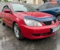 Червоний Міцубісі Lancer, об'ємом двигуна 1.58 л та пробігом 145 тис. км за 5400 $, фото 1 на Automoto.ua