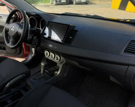 Червоний Міцубісі Lancer, об'ємом двигуна 2 л та пробігом 215 тис. км за 6500 $, фото 8 на Automoto.ua