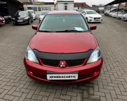 Красный Мицубиси Лансер, объемом двигателя 1.6 л и пробегом 215 тыс. км за 4500 $, фото 2 на Automoto.ua