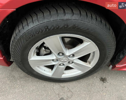 Красный Мицубиси Лансер, объемом двигателя 2 л и пробегом 330 тыс. км за 5250 $, фото 2 на Automoto.ua