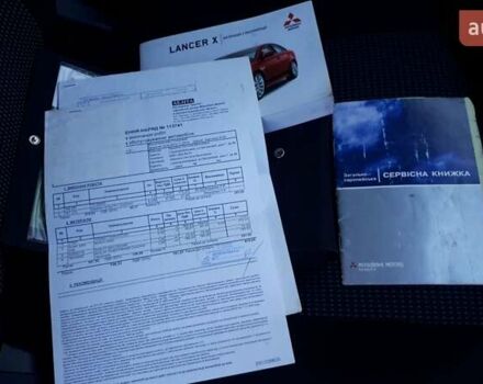Червоний Міцубісі Lancer, об'ємом двигуна 2 л та пробігом 141 тис. км за 7600 $, фото 12 на Automoto.ua