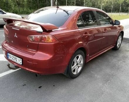 Червоний Міцубісі Lancer, об'ємом двигуна 2 л та пробігом 300 тис. км за 3700 $, фото 4 на Automoto.ua