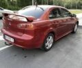 Червоний Міцубісі Lancer, об'ємом двигуна 2 л та пробігом 300 тис. км за 3700 $, фото 4 на Automoto.ua