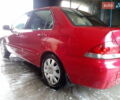 Червоний Міцубісі Lancer, об'ємом двигуна 1.6 л та пробігом 242 тис. км за 5100 $, фото 1 на Automoto.ua