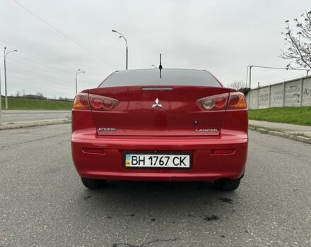 Красный Мицубиси Лансер, объемом двигателя 2 л и пробегом 366 тыс. км за 6500 $, фото 4 на Automoto.ua