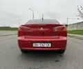 Красный Мицубиси Лансер, объемом двигателя 2 л и пробегом 366 тыс. км за 6500 $, фото 4 на Automoto.ua