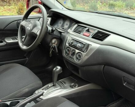 Червоний Міцубісі Lancer, об'ємом двигуна 1.6 л та пробігом 220 тис. км за 4600 $, фото 15 на Automoto.ua