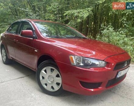 Красный Мицубиси Лансер, объемом двигателя 1.5 л и пробегом 124 тыс. км за 7100 $, фото 2 на Automoto.ua