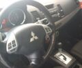 Червоний Міцубісі Lancer, об'ємом двигуна 2 л та пробігом 141 тис. км за 7600 $, фото 13 на Automoto.ua