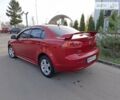 Червоний Міцубісі Lancer, об'ємом двигуна 2 л та пробігом 223 тис. км за 6950 $, фото 4 на Automoto.ua