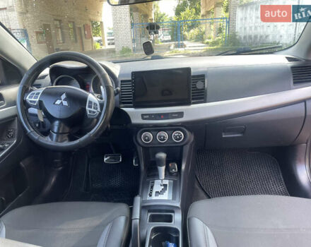 Червоний Міцубісі Lancer, об'ємом двигуна 2 л та пробігом 179 тис. км за 6499 $, фото 11 на Automoto.ua