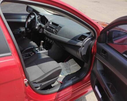 Червоний Міцубісі Lancer, об'ємом двигуна 2 л та пробігом 301 тис. км за 6200 $, фото 2 на Automoto.ua