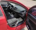 Червоний Міцубісі Lancer, об'ємом двигуна 2 л та пробігом 301 тис. км за 6200 $, фото 2 на Automoto.ua