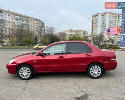 Червоний Міцубісі Lancer, об'ємом двигуна 1.58 л та пробігом 223 тис. км за 6400 $, фото 8 на Automoto.ua