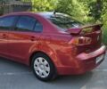 Червоний Міцубісі Lancer, об'ємом двигуна 1.5 л та пробігом 200 тис. км за 6285 $, фото 1 на Automoto.ua