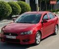 Красный Мицубиси Лансер, объемом двигателя 2 л и пробегом 280 тыс. км за 5900 $, фото 1 на Automoto.ua