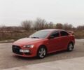 Красный Мицубиси Лансер, объемом двигателя 2 л и пробегом 200 тыс. км за 6000 $, фото 2 на Automoto.ua