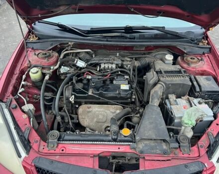 Красный Мицубиси Лансер, объемом двигателя 1.6 л и пробегом 265 тыс. км за 2956 $, фото 9 на Automoto.ua
