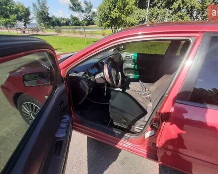 Червоний Міцубісі Lancer, об'ємом двигуна 1.6 л та пробігом 195 тис. км за 5500 $, фото 5 на Automoto.ua