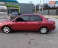 Червоний Міцубісі Lancer, об'ємом двигуна 1.58 л та пробігом 140 тис. км за 6000 $, фото 1 на Automoto.ua
