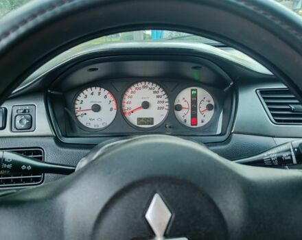 Червоний Міцубісі Lancer, об'ємом двигуна 1.6 л та пробігом 227 тис. км за 5300 $, фото 7 на Automoto.ua