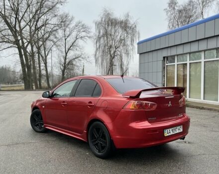 Красный Мицубиси Лансер, объемом двигателя 2 л и пробегом 223 тыс. км за 5800 $, фото 4 на Automoto.ua