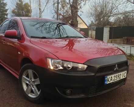 Червоний Міцубісі Lancer, об'ємом двигуна 2 л та пробігом 300 тис. км за 3950 $, фото 3 на Automoto.ua