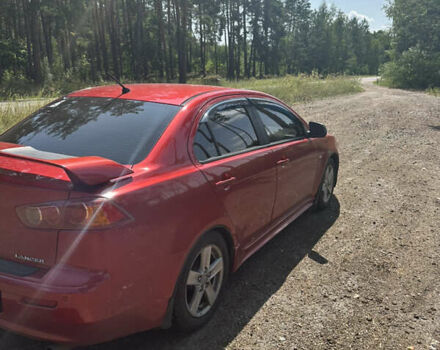Червоний Міцубісі Lancer, об'ємом двигуна 2 л та пробігом 230 тис. км за 5800 $, фото 3 на Automoto.ua