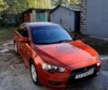 Красный Мицубиси Лансер, объемом двигателя 2 л и пробегом 110 тыс. км за 7500 $, фото 3 на Automoto.ua