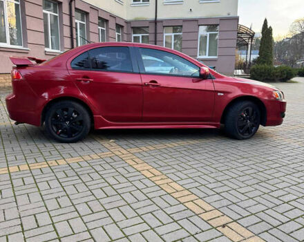 Красный Мицубиси Лансер, объемом двигателя 2 л и пробегом 143 тыс. км за 5200 $, фото 24 на Automoto.ua