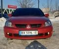 Червоний Міцубісі Lancer, об'ємом двигуна 1.58 л та пробігом 137 тис. км за 6500 $, фото 1 на Automoto.ua