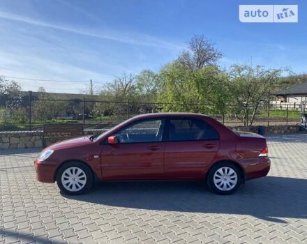 Червоний Міцубісі Lancer, об'ємом двигуна 0 л та пробігом 160 тис. км за 4244 $, фото 38 на Automoto.ua