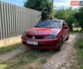 Красный Мицубиси Лансер, объемом двигателя 1.58 л и пробегом 140 тыс. км за 5999 $, фото 1 на Automoto.ua