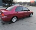 Червоний Міцубісі Lancer, об'ємом двигуна 1.58 л та пробігом 140 тис. км за 6000 $, фото 5 на Automoto.ua