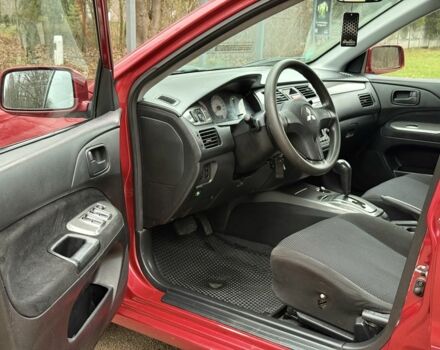 Червоний Міцубісі Lancer, об'ємом двигуна 1.6 л та пробігом 220 тис. км за 4600 $, фото 12 на Automoto.ua