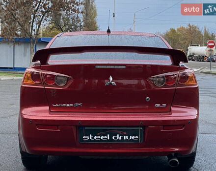 Красный Мицубиси Лансер, объемом двигателя 1.5 л и пробегом 120 тыс. км за 7699 $, фото 4 на Automoto.ua