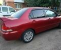Червоний Міцубісі Lancer, об'ємом двигуна 1.6 л та пробігом 227 тис. км за 5300 $, фото 3 на Automoto.ua