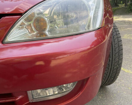 Червоний Міцубісі Lancer, об'ємом двигуна 1.6 л та пробігом 270 тис. км за 5699 $, фото 24 на Automoto.ua